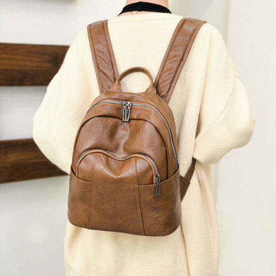 Système de transport Des sangles réglables personnalisées Sac à dos fermeture à glissière en cuir PU noir pour femmes